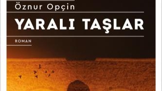 Öznur Opçin'in ilk kitabı Yaralı Taşlar yayımlandı